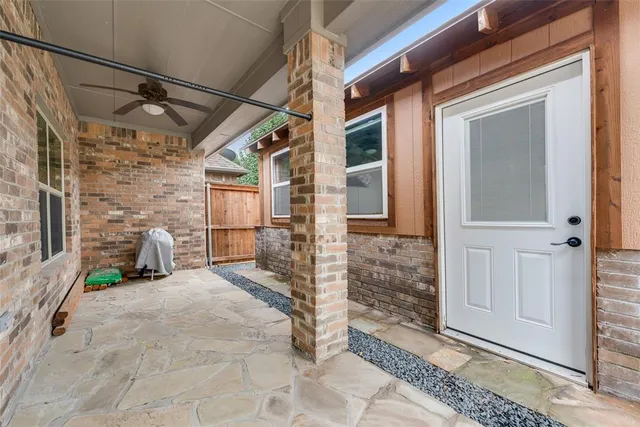 a view of a porch with seating space