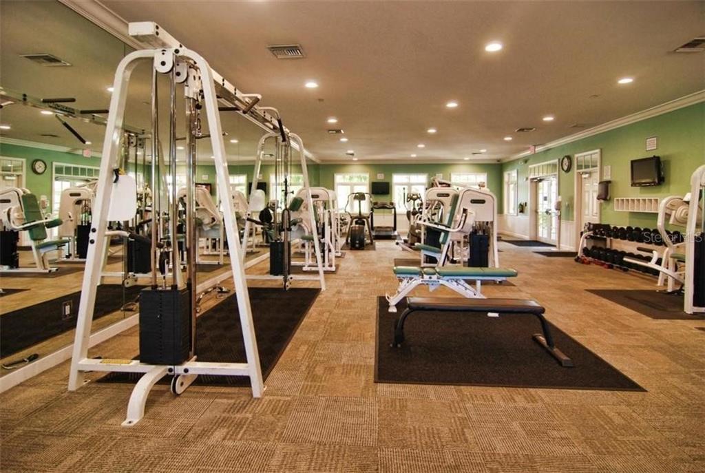 37 Harbour Isle Drive East, Unit 206 Fort Pierce, FL 34949 - Photo 29 of 37 a view of a room with gym equipment