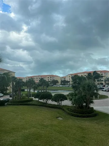 a view of a lake with a big yard