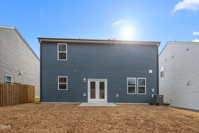 a house view with a backyard space