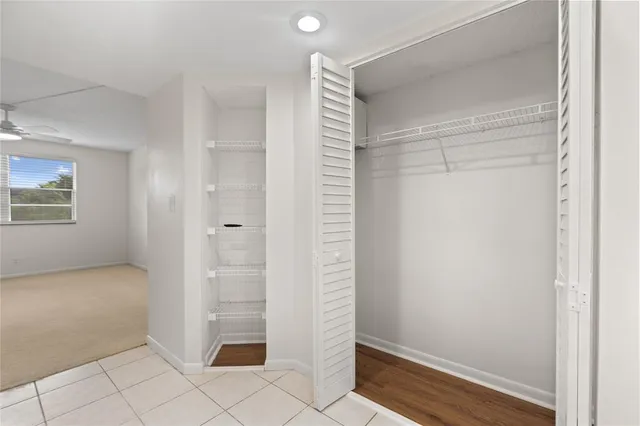 a view of a room with a large window