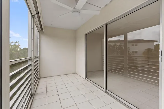 a view of a room with a large window