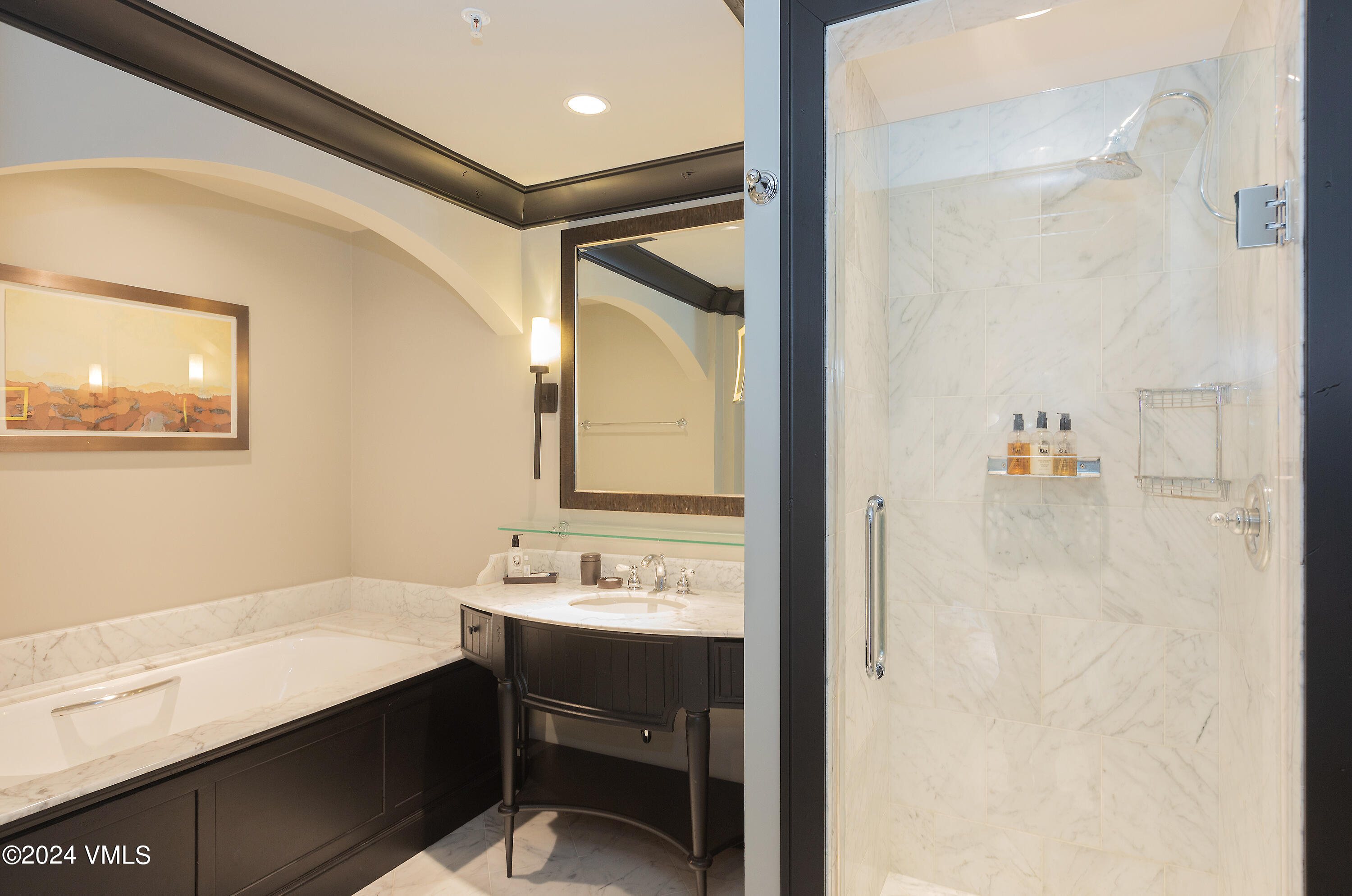 130 Daybreak Ridge Road, Unit HS658/660 Avon, CO 81620 - Photo 15 of 27 a bathroom with a sink and a mirror