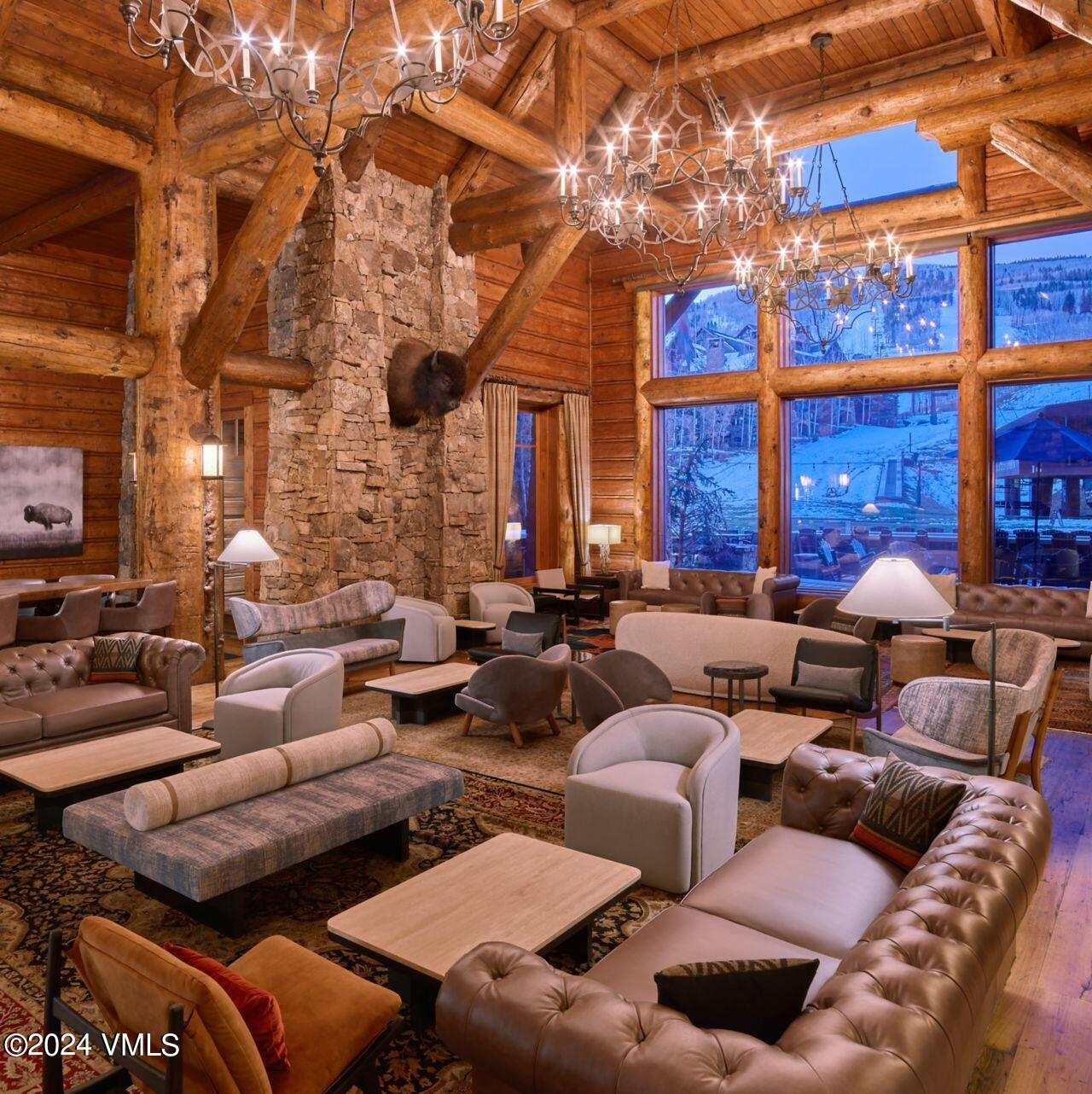 130 Daybreak Ridge Road, Unit HS658/660 Avon, CO 81620 - Photo 20 of 27 a group of cars parked in front of a building