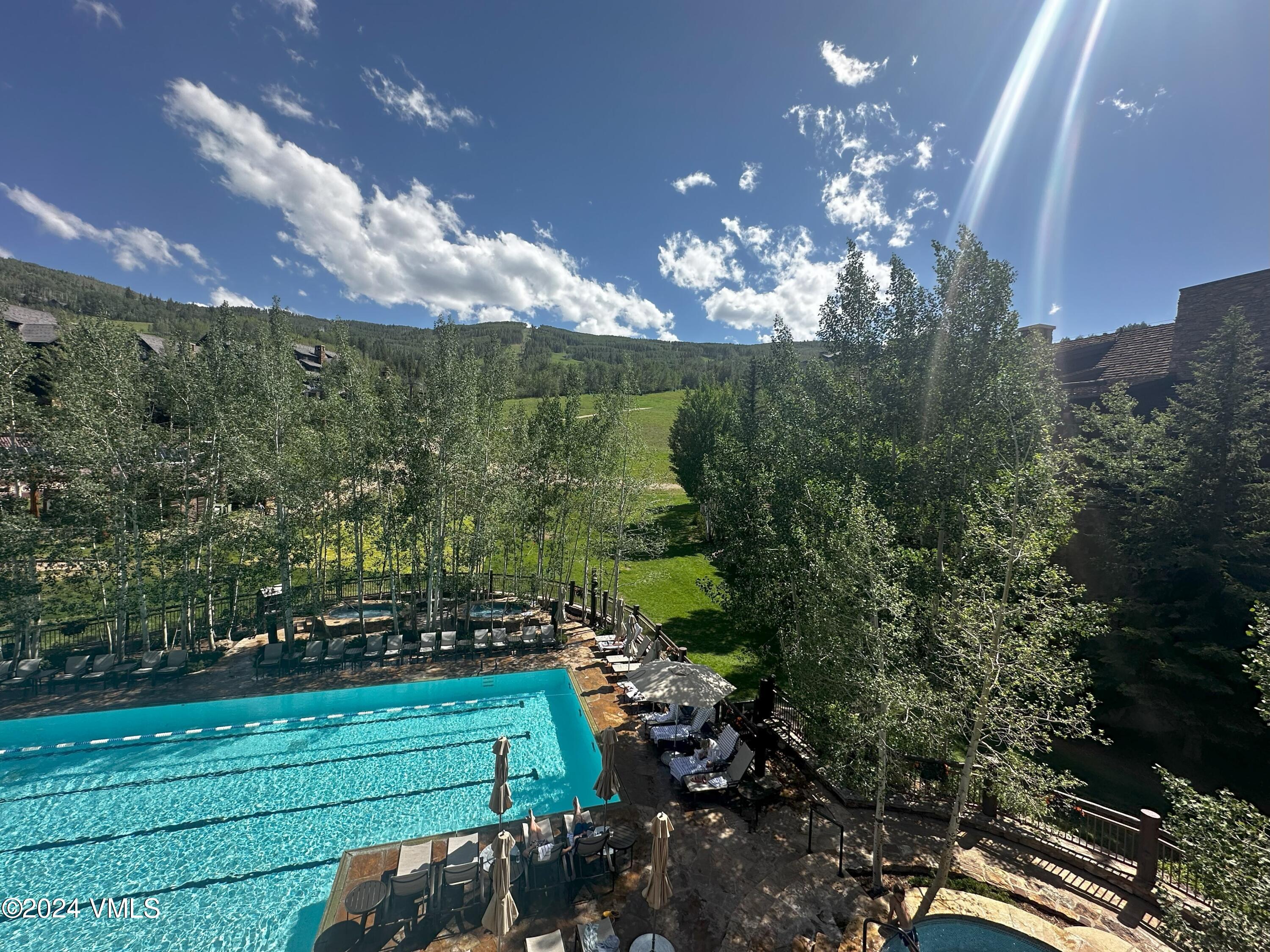 130 Daybreak Ridge Road, Unit HS658/660 Avon, CO 81620 - Photo 24 of 27 a view of a fountain in a yard