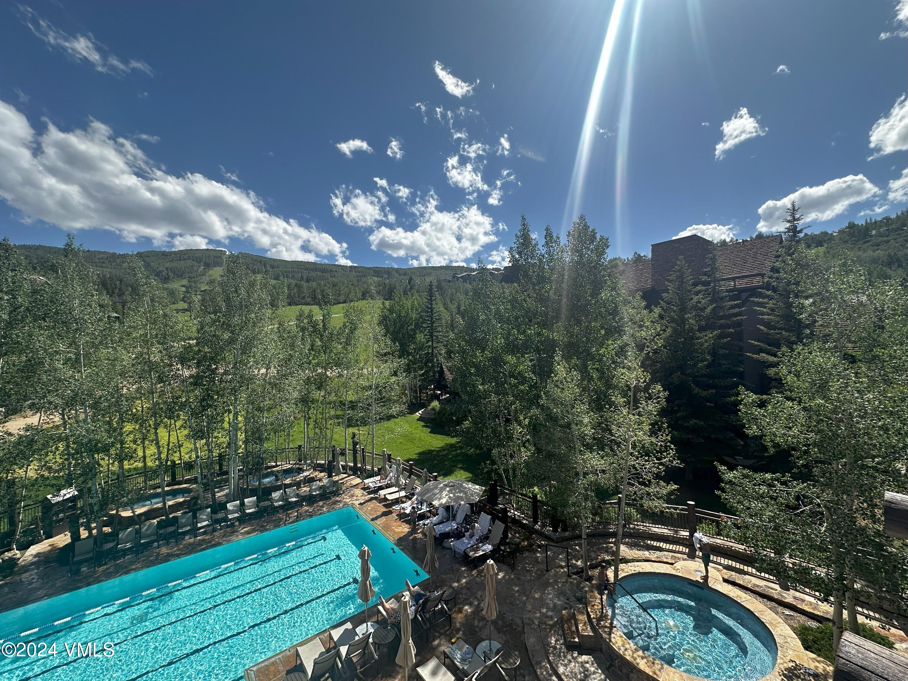 130 Daybreak Ridge Road, Unit HS658/660 Avon, CO 81620 - Photo 25 of 27 a view of a fountain in front of a house