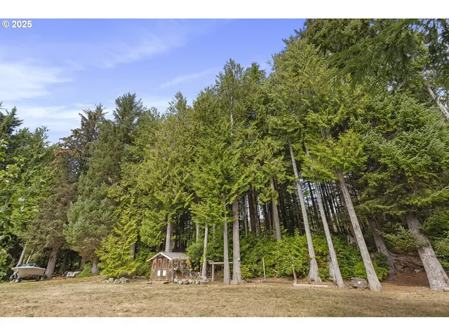 a backyard of a house with lots of green space