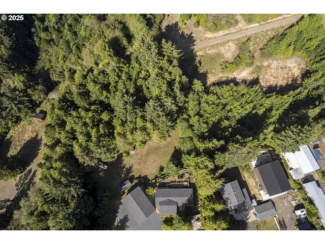 a view of a house with a tree