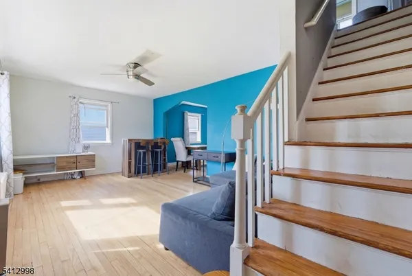 a view of a livingroom with furniture and a couch