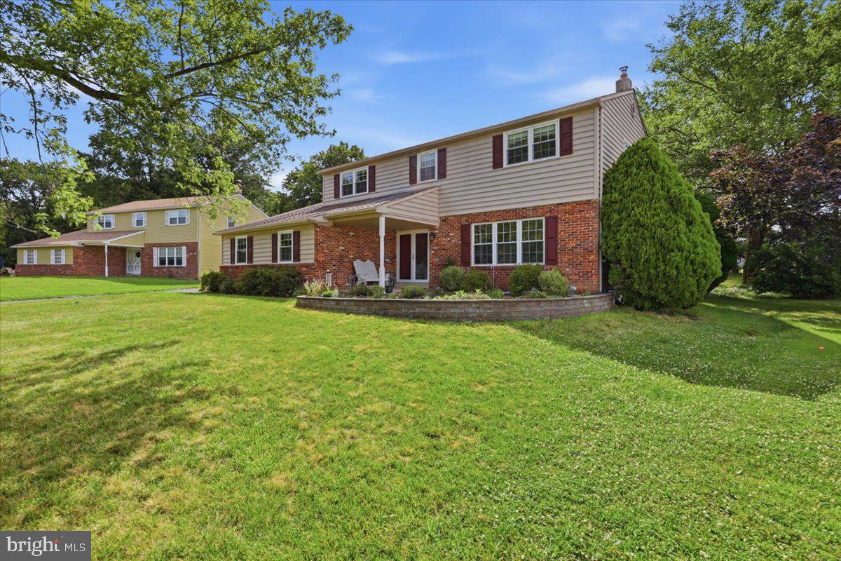 148 Regency Drive Eagleville, PA 19403 - Photo 1 of 42 Charming home with lush green lawn.