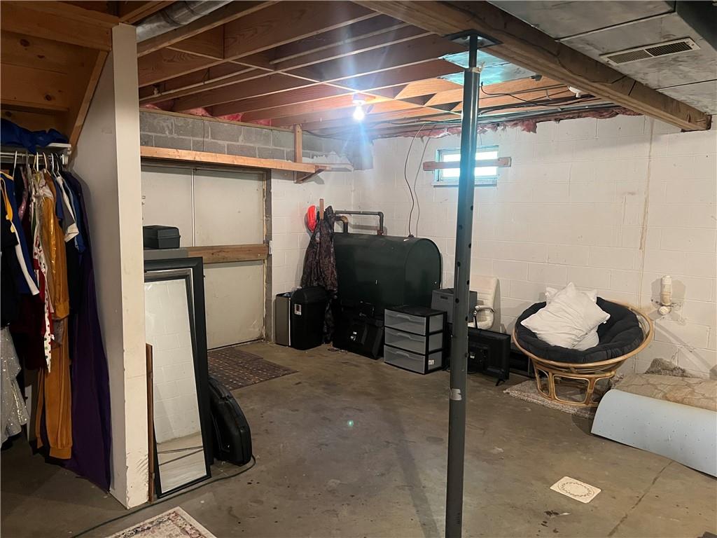 121 Pitts Road Jamestown, PA 16134 - Photo 25 of 28 a room with lots of storage and a table