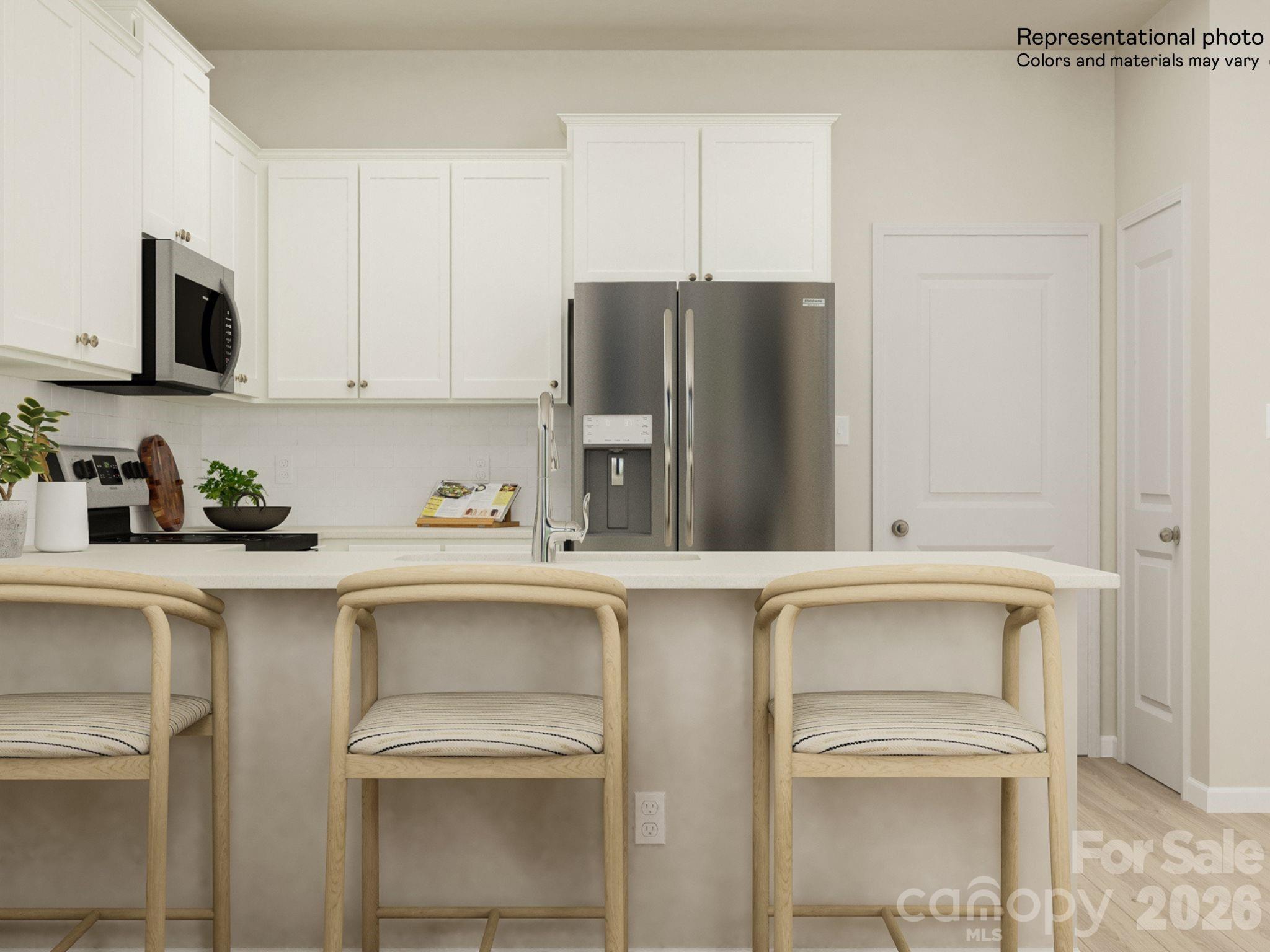 7002 Juneberry Way Maiden, NC 28650 - Photo 15 of 25 a kitchen with a sink and cabinets