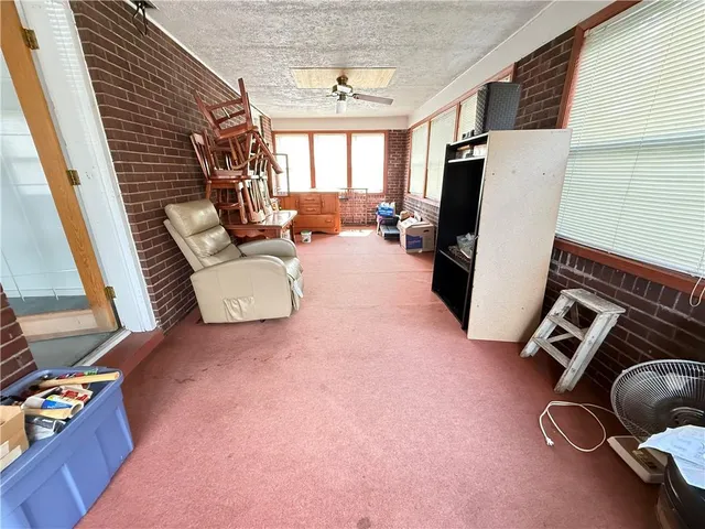 a bathroom with a sink a toilet and bathtub