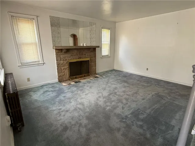 a living room with a fireplace