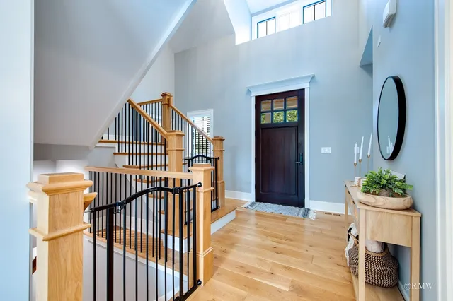 a view of entryway with wooden floor