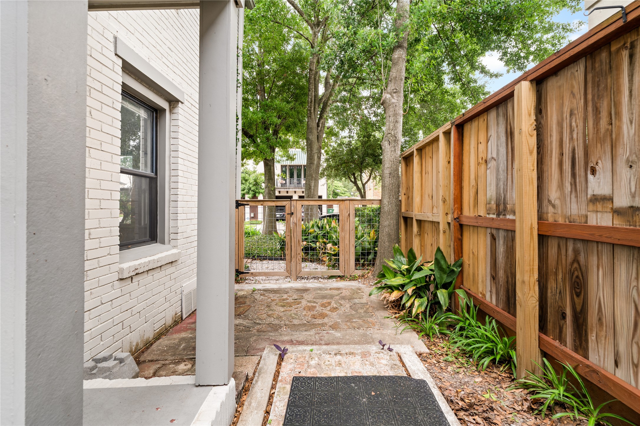 2202 West Main Street Houston, TX 77098 - Photo 30 of 32 a view of a house with backyard and sitting area