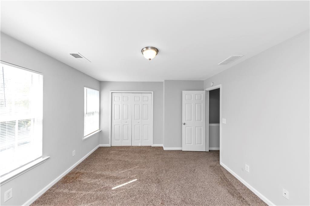 735 Crestwell Circle Atlanta, GA 30331 - Photo 24 of 31 a view of an empty room with a window