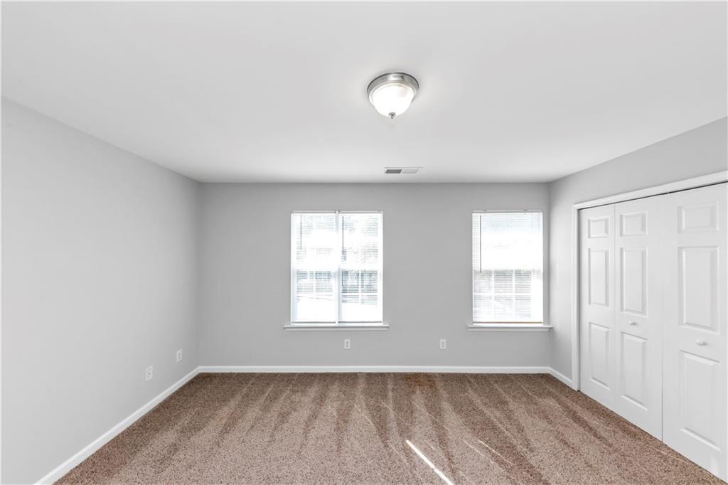 735 Crestwell Circle Atlanta, GA 30331 - Photo 25 of 31 an empty room with windows