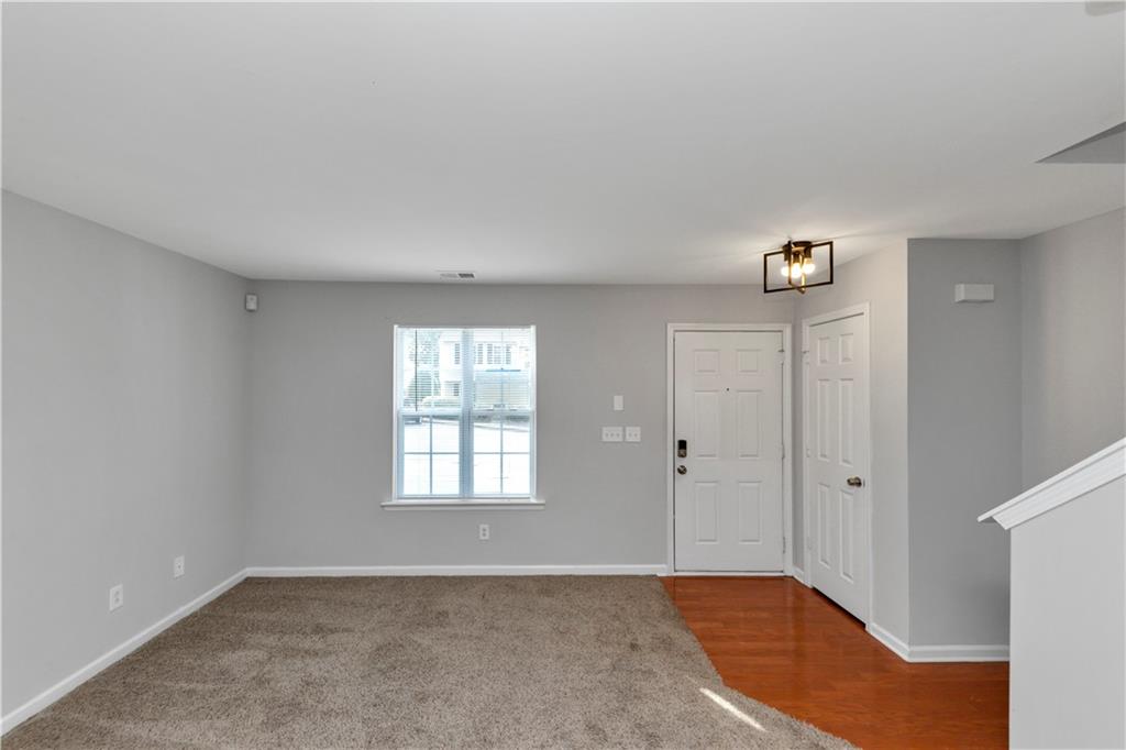 735 Crestwell Circle Atlanta, GA 30331 - Photo 3 of 31 an empty room with windows