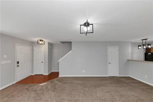 a view of empty room with windows