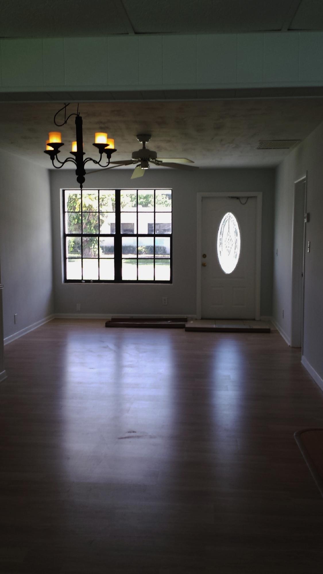 356 Winged Foot Road Palm Springs, FL 33461 - Photo 4 of 25 Reverse View- Family room to Living room