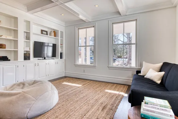 a living room with furniture and window