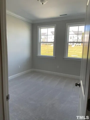 en empty room with windows