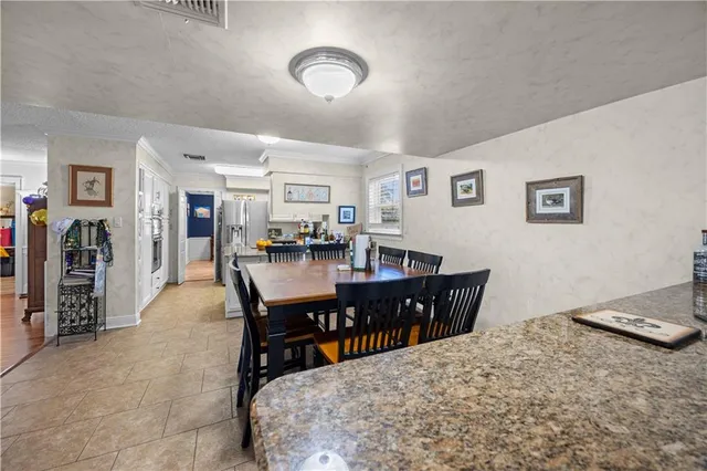 $565,000 | 9631 Wildwood Drive, River Ridge, LA 70123