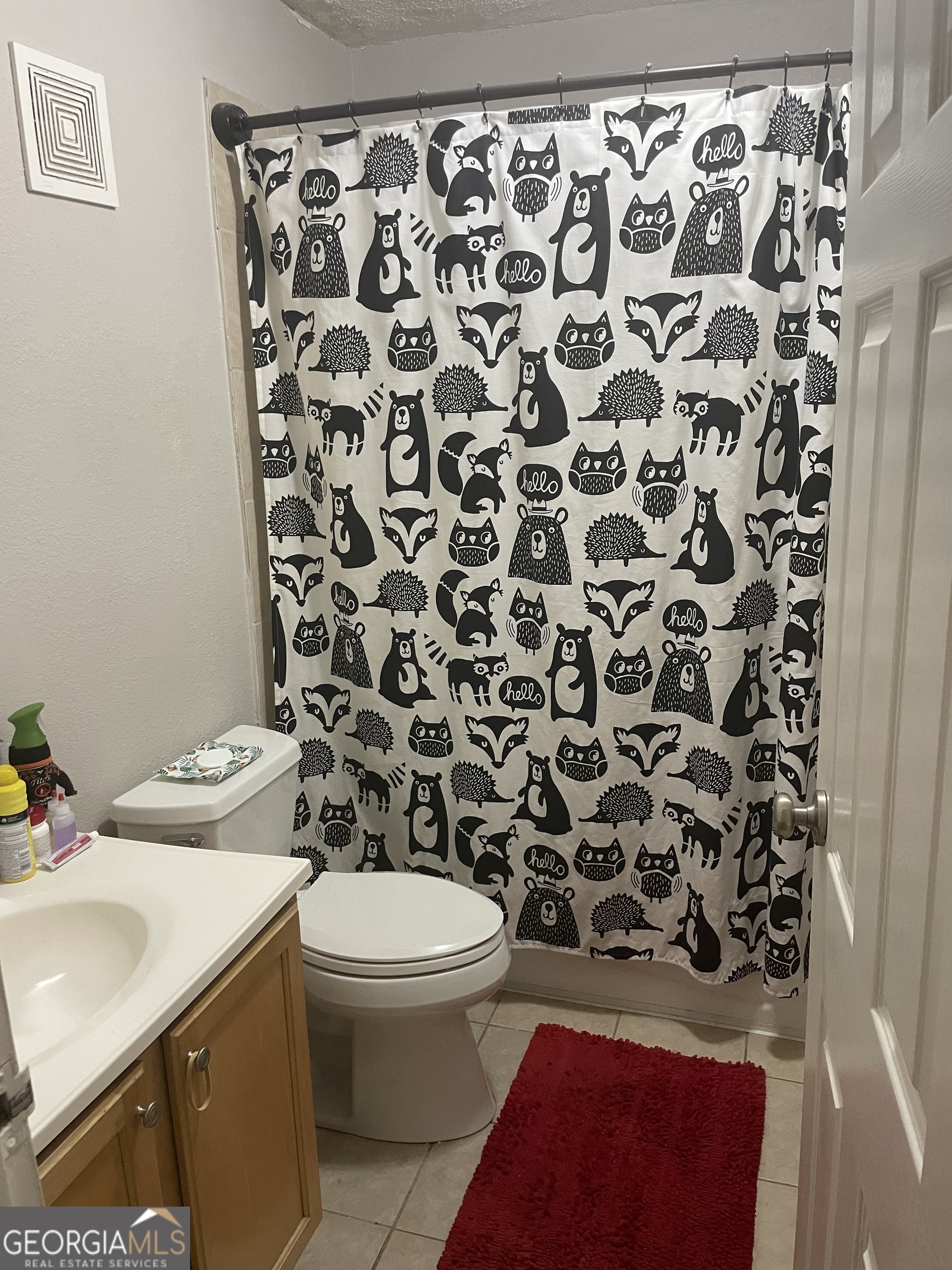 250 Little Street, Unit B102 Athens, GA 30605 - Photo 11 of 20 a bathroom with a sink toilet and shower