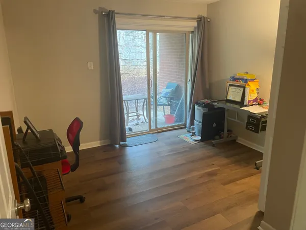 a view of a livingroom with furniture