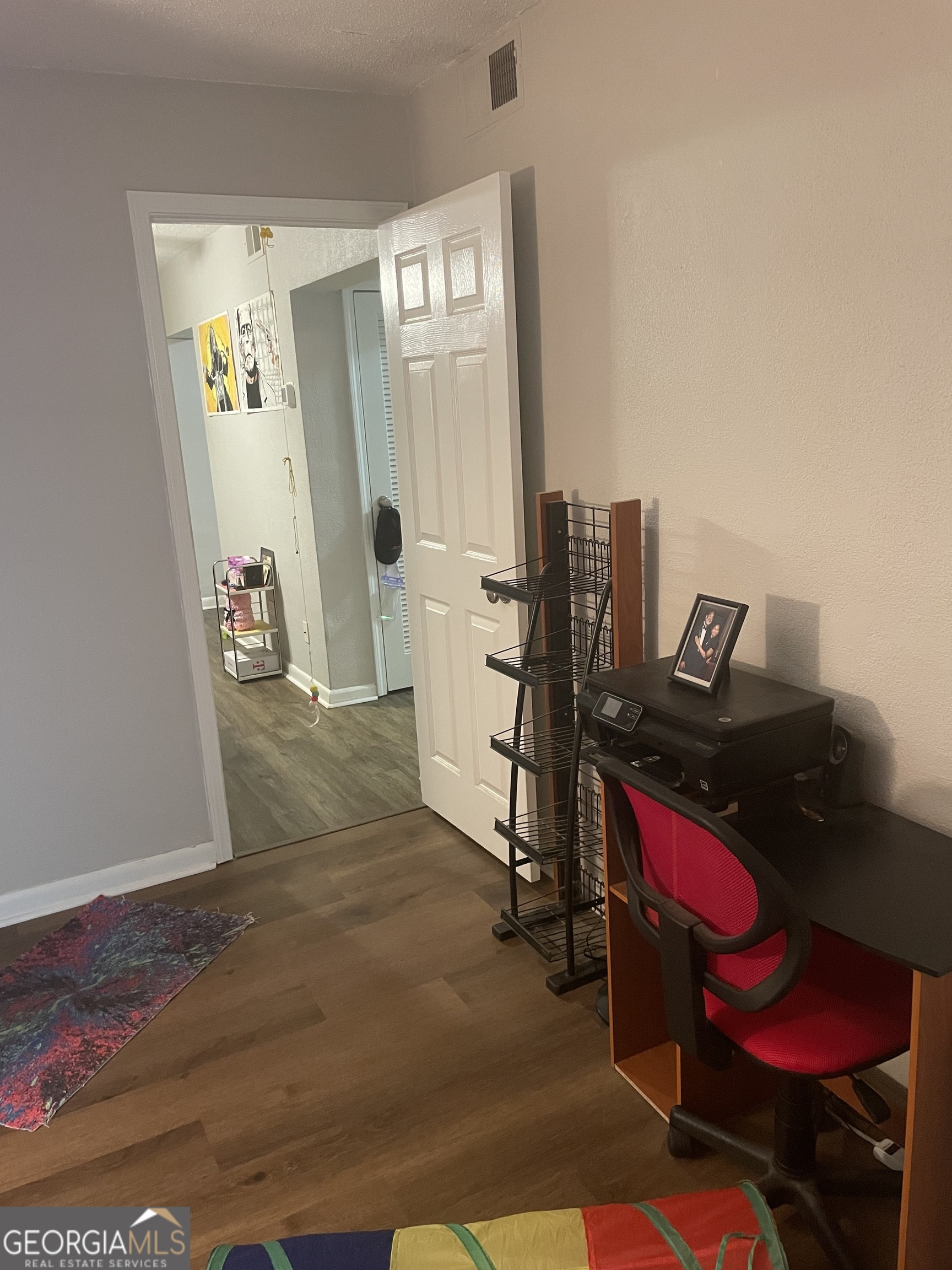 250 Little Street, Unit B102 Athens, GA 30605 - Photo 10 of 20 a view of a hallway with workspace