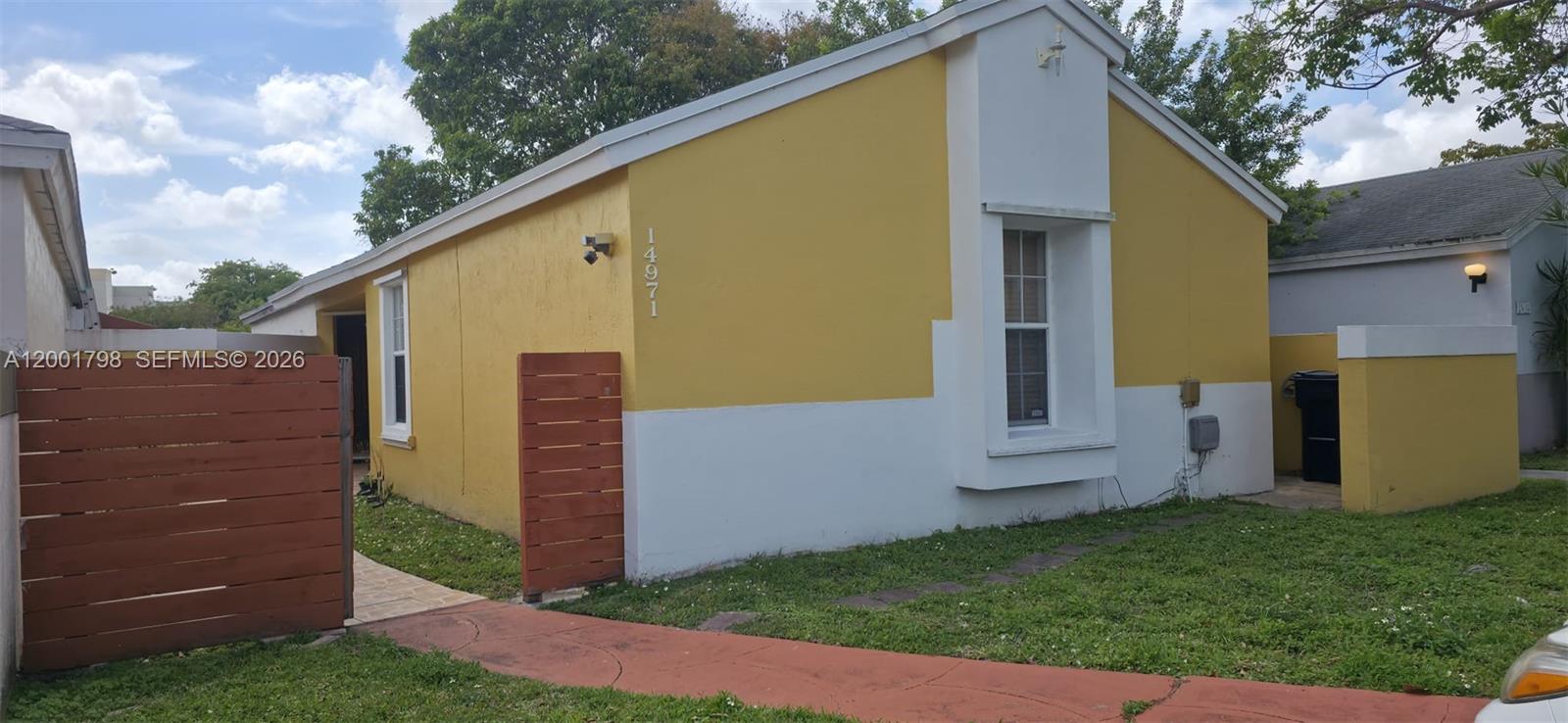 14971 Southwest 75th Terrace Miami, FL 33193 - Photo 2 of 24 a view of a back yard of the house