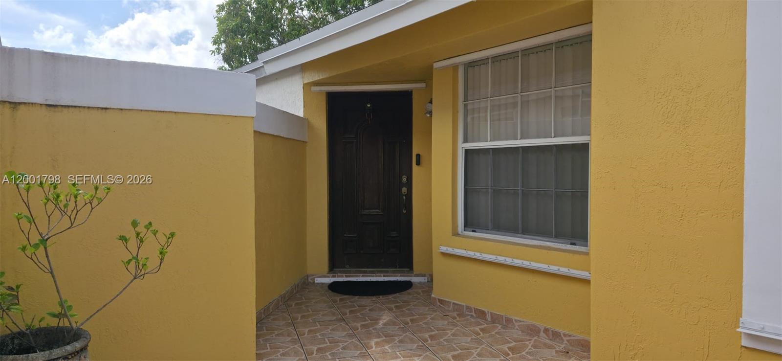 14971 Southwest 75th Terrace Miami, FL 33193 - Photo 4 of 24 a view of front door