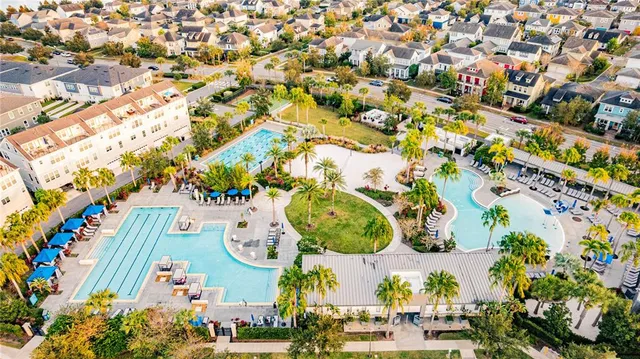 an aerial view of a house with a ocean view