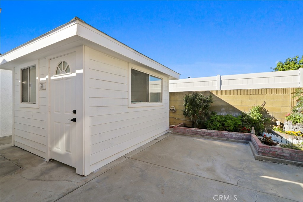 5633 Lakia Drive Cypress, CA 90630 - Photo 22 of 25 a view of a house with a outdoor space