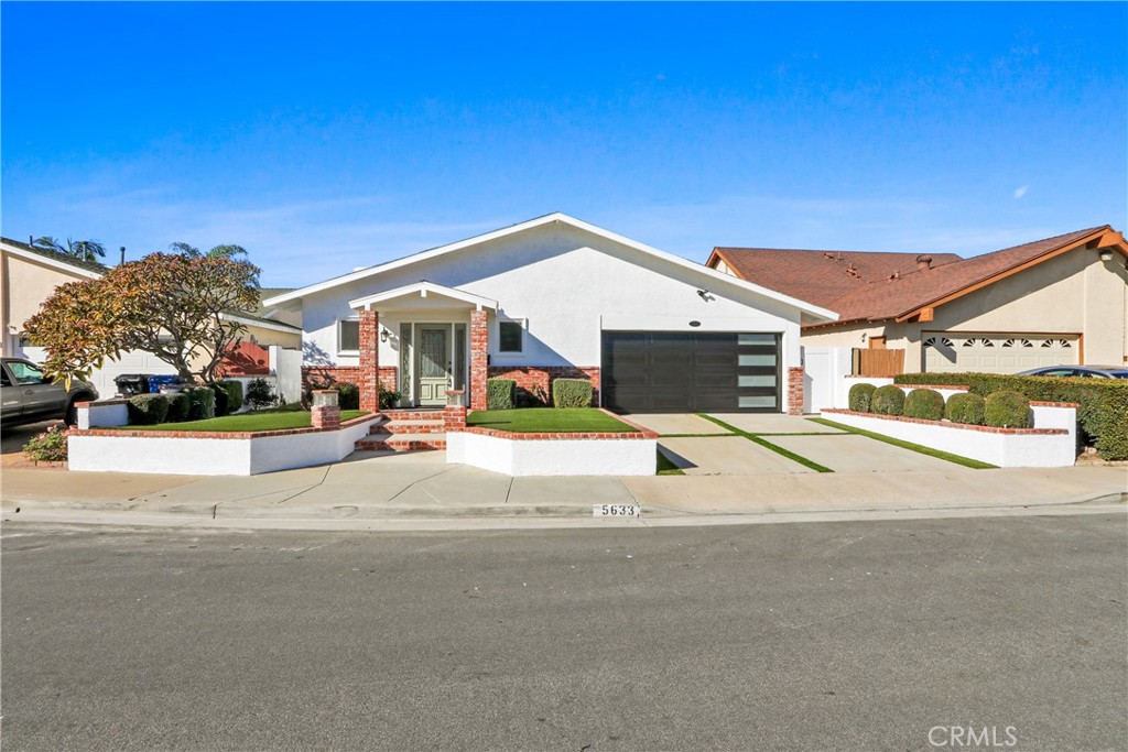 5633 Lakia Drive Cypress, CA 90630 - Photo 25 of 25 a view of multiple houses with a yard