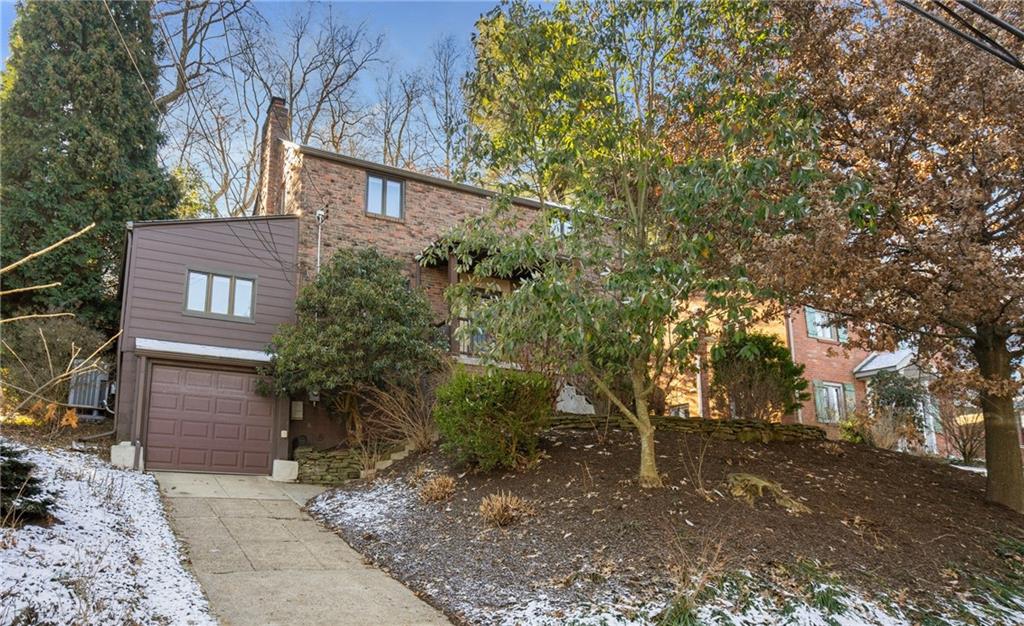 306 Washington Road Pittsburgh, PA 15221 - Photo 3 of 40 Beautiful landscaping surrounds this rain garden property.