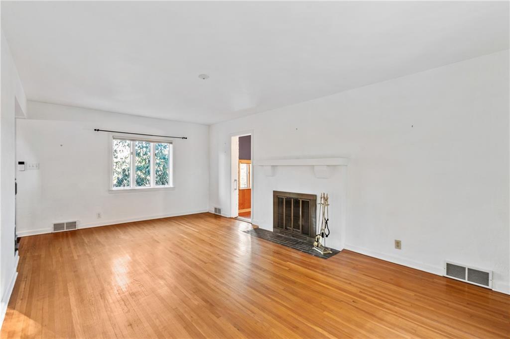 306 Washington Road Pittsburgh, PA 15221 - Photo 9 of 40 Living room looking toward the front of the home.