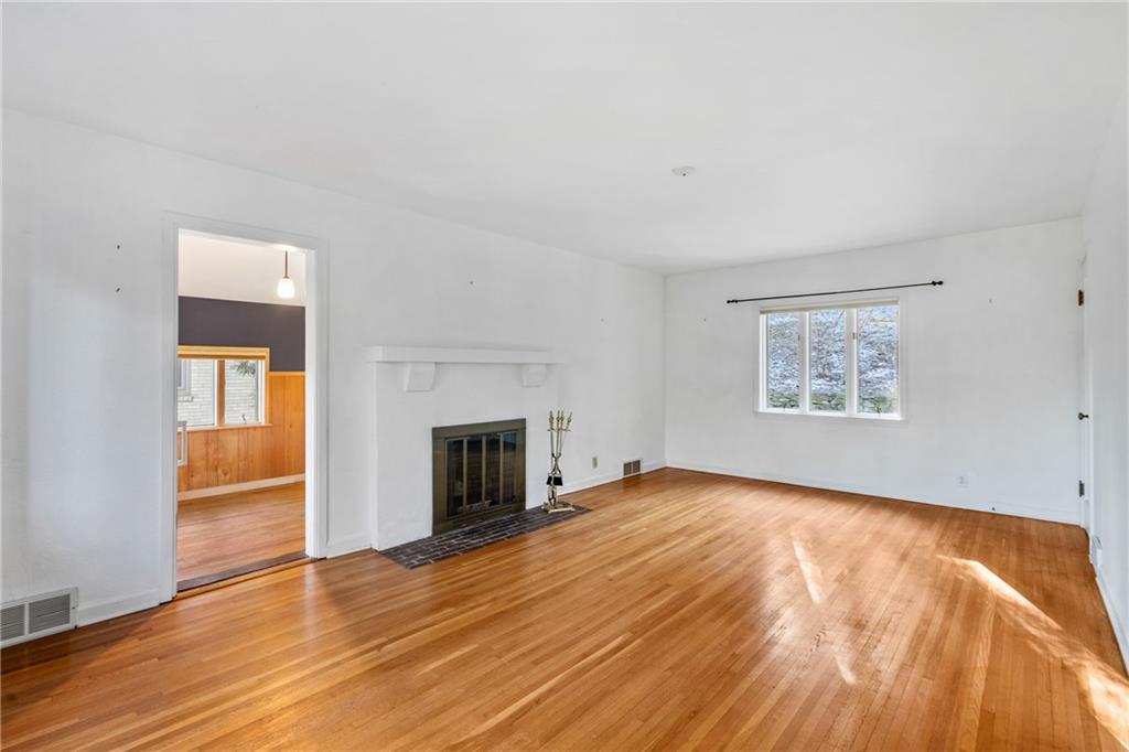 306 Washington Road Pittsburgh, PA 15221 - Photo 10 of 40 Living room - doorway on left leads to the den.