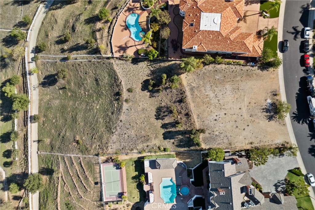 22451 South Summit Ridge Circle Chatsworth, CA 91311 - Photo 17 of 19 an aerial view of residential houses with outdoor space