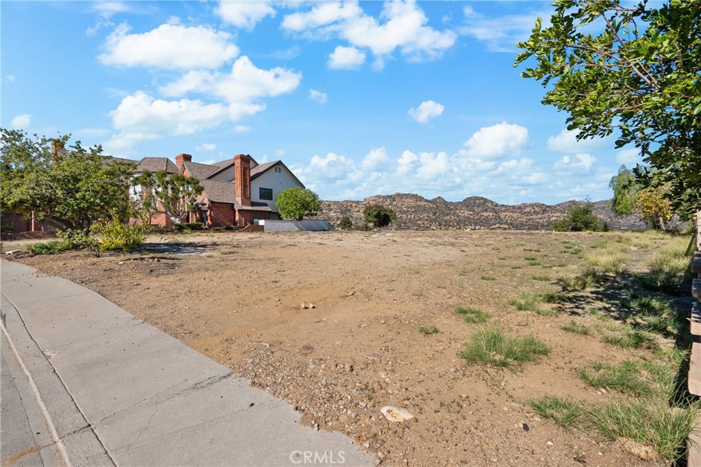 22451 South Summit Ridge Circle Chatsworth, CA 91311 - Photo 3 of 19 a view of a road with an outdoor space