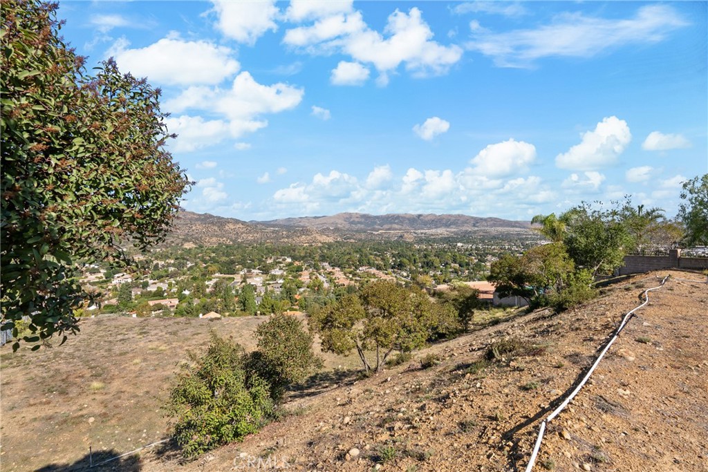 22451 South Summit Ridge Circle Chatsworth, CA 91311 - Photo 5 of 19 a view of a city with lots of trees