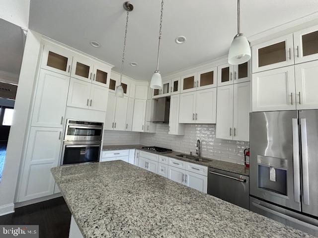 110 Samjan Circle Hightstown, NJ 08520 - Photo 12 of 40 a kitchen with stainless steel appliances granite countertop a stove sink and refrigerator