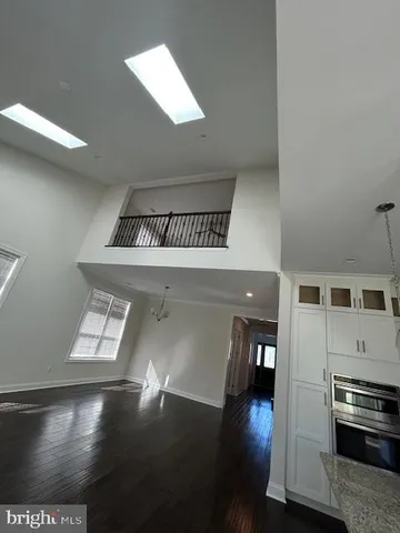 a view of a livingroom with wooden floor