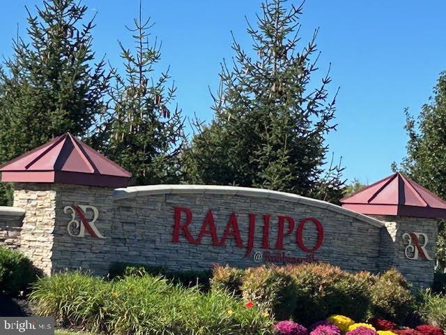 110 Samjan Circle Hightstown, NJ 08520 - Photo 2 of 40 a sign that is sitting on a wooden fence