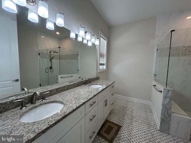 110 Samjan Circle Hightstown, NJ 08520 - Photo 26 of 40 a bathroom with a granite countertop double vanity sink and a mirror