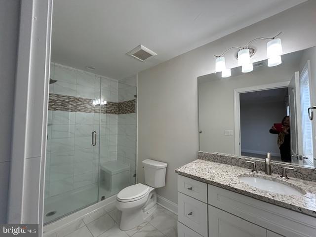 110 Samjan Circle Hightstown, NJ 08520 - Photo 29 of 40 a bathroom with a granite countertop sink toilet a mirror and a shower