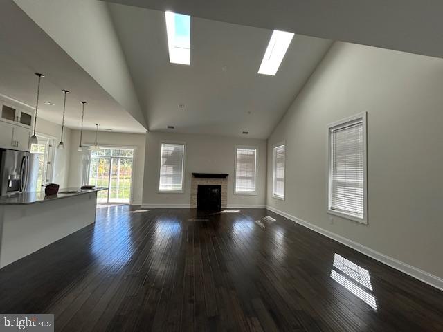 110 Samjan Circle Hightstown, NJ 08520 - Photo 5 of 40 a view of an empty room with wooden floor and a window