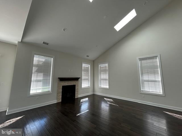 110 Samjan Circle Hightstown, NJ 08520 - Photo 7 of 40 an empty room with wooden floor fireplace and windows