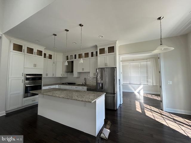110 Samjan Circle Hightstown, NJ 08520 - Photo 10 of 40 a kitchen with stainless steel appliances granite countertop a sink a stove and a refrigerator